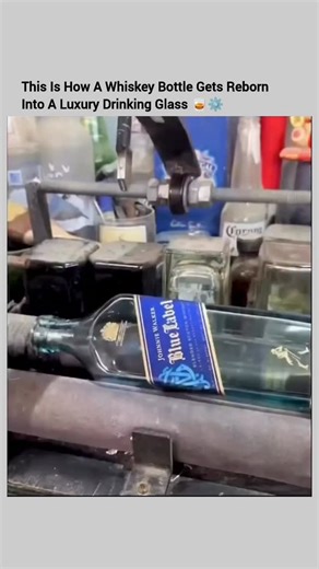 Industrial Technology on Instagram: "This is how a premium whiskey bottle is physically transformed into a luxury drinking glass.🧊✨ Instead of melting the glass down, the bottle itself becomes the finished product. A precise scoring tool cuts the bottle at an exact height, then controlled temperature changes cause the glass to separate cleanly along the cut line. Once separated, the rim is still razor sharp. It’s slowly sanded, smoothed, and polished using multiple grits until the edge is round