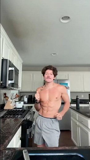 Shirtless Man Shows Smooth Dance Moves in the Kitchen 🔥 Must-See Vibes!