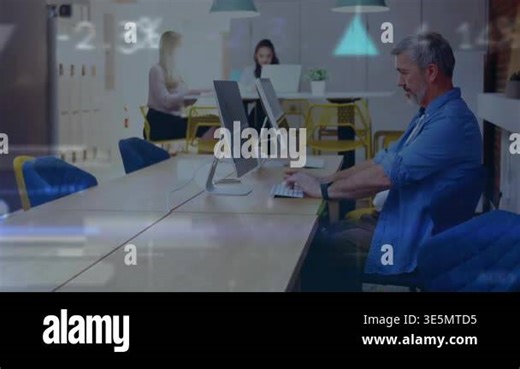 A digital composite of various financial charts. The executive is working on a computer in an office setting. 4k resolution Stock Video Footage - Alamy