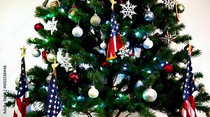 Patriotic Christmas tree featuring small USA flags, highlighting American holiday traditions. Perfect for seasonal greetings video animation. Stock Video