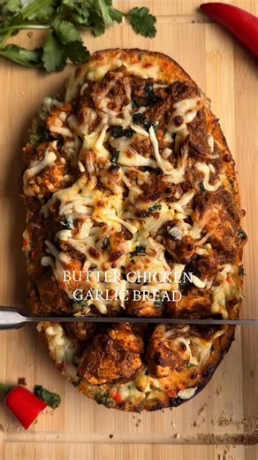 Butter Chicken Garlic Bread 🤯 Smothered in a coriander, garlic & chilli butter, topped with leftover butter chicken and melted mozzarella 🧄🧈🧀 The ultimate Indian-Italian fusion you didn’t know you needed 😮‍💨 Recipe below — save. Follow @theculinarycountess for more easy recipes. Ingredients 1/2 Loaf of bread 80g Butter, softened 1 tbsp Coriander, finely chopped 5 Garlic cloves, minced Red chilli - finely diced (add to your preference) 80g-100g Grated mozzarella, or your preference Leftover