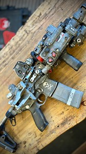 Finished this prop cyberpunk gun! Kitbash of some cheap airsoft gun parts, real stuff, misc parts. Painted with acrylics, graphite powder, metallic wax, cricut stickers . . . . . . #cyberpunk #costume #art #guns #craft | Ivanusmaximus