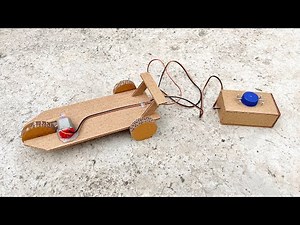 How to make one motor cardboard R.C car with cardboard pulley and wheels at home.