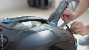 Preparing the vacuum cleaner for wet cleaning. Connecting the water supply tube and the main hose