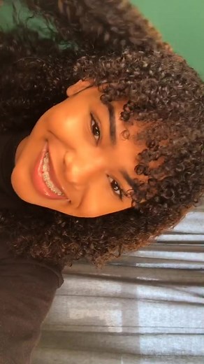 This is how my hair looks with product after cutting it 😁😁