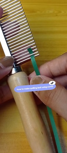 From paper strips to perfect leaves 🌿✨—discover the art of quilling with this comb tutorial! #DIYPaperFlowers #HandmadeArt #QuillingArt #CreativeCrafts #papercraft #quillingfllower