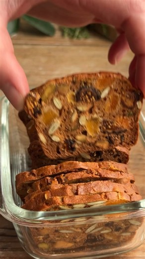 These gourmet fruit and nut crackers are packed with dried fruit and nuts, but are still super crispy and crunchy. They're the perfect addition to any charcuterie board or for snacking! Recipe in the comments! | Crowded Kitchen