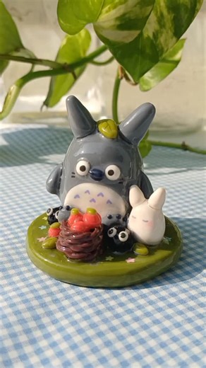 yoake on Instagram: "remade this totoro figurine !! most of the details are still the same but i made the base a little larger to fit in more stars ⭐️ i want to work on more larger projects in 2026 !!"