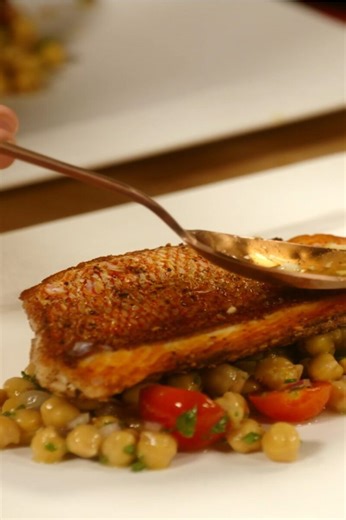 Crispy snapper with chickpea tomato salad