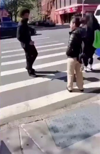 This is the fucking essence of it, right here...the visceral, stomach-turning proof of what Democrat soft-on-crime policies don’t just enable, but actively breed: a feral underclass of human predators who operate with the impunity of apex psychopaths in a city gutted by ideological rot.Look at this barbarian. This masked sack of predatory entitlement struts across a Manhattan crosswalk in broad fucking daylight, locks eyes on a 14-year-old girl with her backpack and her innocent path to wherever