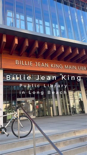 LBC Vibe | Long Beach CA on Instagram: "📚✨ The Billie Jean King Main Library is so much more than books. This Downtown Long Beach library is basically a free, all-in-one community resource for every age and stage of life: 👧 Kids Space (KidSpace) — Story Theater, early literacy areas, STEAM play, hands-on learning 🧑‍🎓 Teen Space — Dedicated area just for teens to study, collaborate, create, or chill 📚 Massive book & media collection — Books, audiobooks, movies, music & more 💻 Free computers