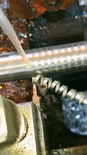 Drawing sharp metal wire.