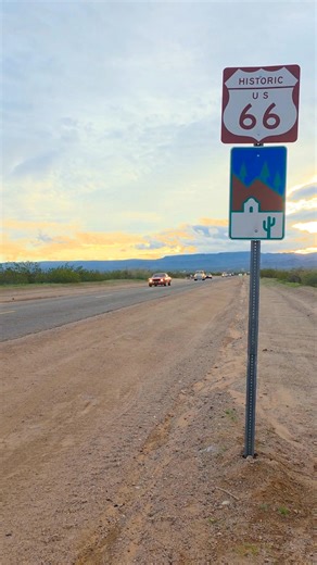 Classic cars cruise the Oatman Highway on Historic Route 66 during the Drive Home, heading east from the Santa Monica Pier all the way to Chicago and on to Detroit for the Detroit Auto Show. With a big Historic Route 66 sign along the open highway, this is Route 66 history rolling right past. #route66 #oatmanarizona #thedrivehome | Route 66 Road Relics