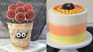 I got the cakes dressed up for Halloween! Would you rather go dressed up as a Mummy or Candy Corn? Mummy Cake Recipe https://www.hanielas.com/2016/10/mummy-flower-vase-cake-with-sugarveil.html | Haniela's