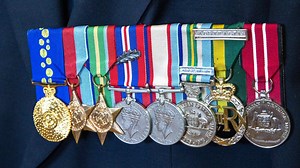 Major John Davis receives his defence medal