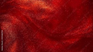 Slow Motion Swirling gold particles in dark red liquid. Golden particles slowly move and form fantastic, impressive maelstrom. A magical galaxy of countless golden dust particles in red fluid motion.
