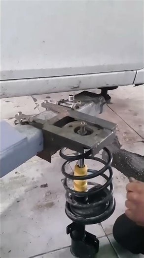 Custom Tool for Compressing Heavy Suspensions