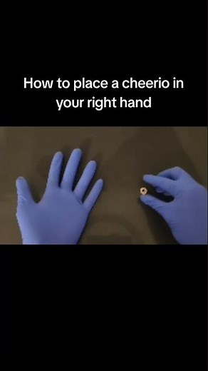 How to place a cheerio in your right hand #cheerio #hand