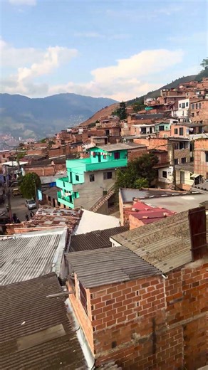 City & slum view of Medellin from Cable car Line L