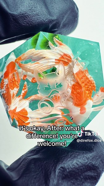 Here’s my biggest tip for making dice.. hand paint your inclusions! No matter how cool you think the raw resin is.. adding shade and highlights makes everything pop🖤 .. #dnd #dungeonsanddragons #dice #dicemaking #handmadedice #dicemaker #dndtiktok #dicegoblin #resin #resinart #koi