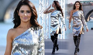 Cheryl dazzles in silver dress for Paris Fashion Week