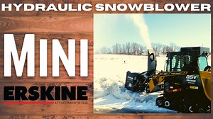 ASV RT-40 with a Mini Hydraulic Snowblower blowing hard frozen snow banks in parking lot.mp4