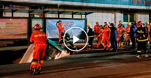 Video Shows Bus Falling Into Sinkhole in China
