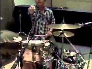 Bruno Mars playing the drums like a pro