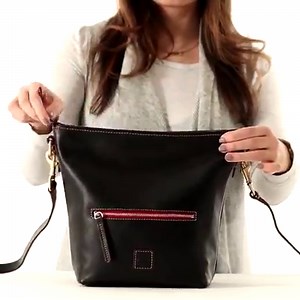 13K views · 290 reactions | Did you know if your bag has a 3-piece strap, you can completely transform your silhouette? Check out the blog for more! https://bit.ly/3kSvfeW | Dooney & Bourke | Facebook