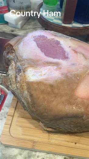 This is the very best and most juicy country ham!! The recipe is at the end of this video! So delicious! #fyp #countryham#ham #supper #holidays