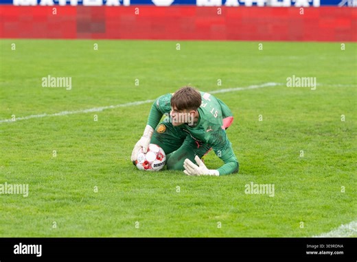 April 19, 2026, Marschwegstadion, Oldenburg, GER, RLN, VfB Oldenburg vs FC St.Pauli II U23, DFL regulations prohibit any use of photographs as image sequences and/or quasi-video, in the picture Simon SPARI ( FC St.Pauli II U23 #1 ) holds the ball firmly Ph Stock Photo - Alamy