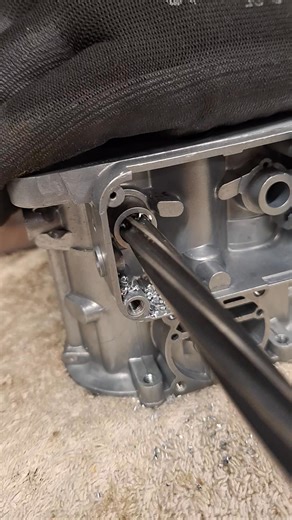 Reaming worn out bushing on a weber carburetrorn, ready for new bush installn, which will need reaming to size. In this instance e this carburettor has had oversized shafts fitted in the past, at 8.4mm which we will retain. | Classic Carbs UK