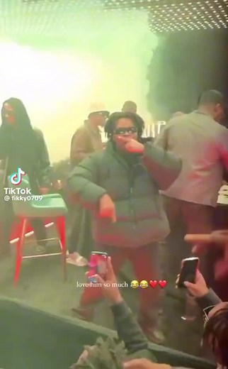 Energetic Dance Vibes in Smoky Party Atmosphere