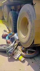 Corpse And Motorcycle Wreckage After Accident