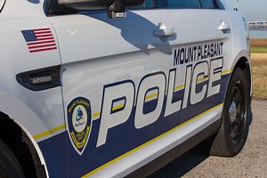 Mount Pleasant (SC) Officer Doug Richards pulled a woman from a burning vehicle when he came upon it just after it crashed. Officer Richards remained calm during the chaotic situation, put out the fire, and reassured the driver as he got her out of the car. The collision occurred on May 28, 2022, around 1:30 a.m. at the 209 exit off Interstate 26. Officer Richards was driving home from work in his patrol car after his shift in Mount Pleasant. | Mount Pleasant Police Department