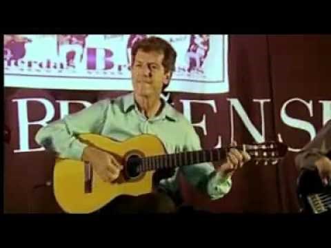 Guitarrista tocando canciones del Oeste