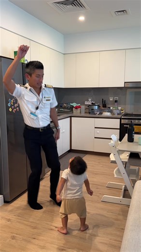 Toddler's Dance Moves with Papa: A Daily Life Moment