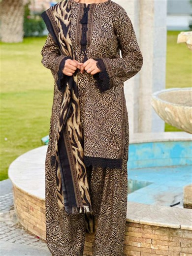 Tiger Print Lawn Suit ✨ Trendy animal print on soft lawn fabric, perfect for a bold and stylish summer look. dm for more📥 0.3.1.7.6.0.8.4.3.4.0 #LawnSuit#viralvideo #fypシ゚viral #trendingsuit #newarival