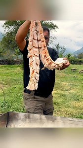 Golden fried fish in aromatic oil under the open sky – crispy on the outside and full of natural flavor. Another masterpiece from Wilderness Cooking. #wildernesscooking #outdoorcooking #friedfish #naturelovers | Wilderness Grill
