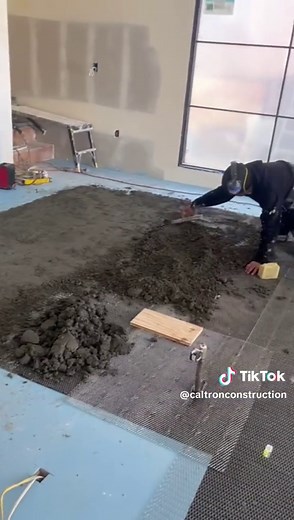 Installing tile (step #3) 3.Waterproofing: - Apply the hydro ban waterproofing and crack isolation solution membrane according to the manufacturer's instructions. 4.Leveling Subfloor:Add a layer of building paper or underlayment to further level the subfloor 5. Cement Base Leveling Mix #flooring #caltronconstruction #losangelescontractor #losangelesconstruction #tilework #tiletok #tiles #constructiontips #constructionworker #constructiontiktok