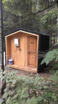 Off grid outhouse - Shower with open pit toilet + hot water