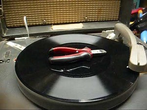 Repair of a model AE4 tube talking book record player from 1968