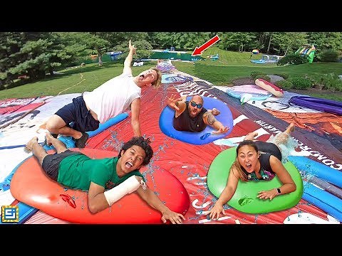 World's Biggest Giant 8ft Water Balloon Waterslide Challenge!!