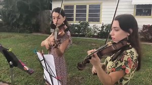 7.8K views · 76 reactions | LISTEN: Sisters Valentina and Annabella Paolucci decided to share their violin talents with their neighbors on Saturdays, to help those in isolation during the coronavirus crisis. Read more: https://bit.ly/3eGW2YO | CBS 12 News | Facebook