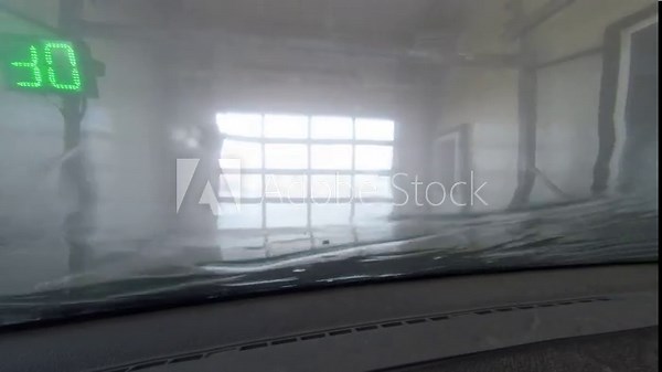 Robotic automatic car wash. Work process. View from the car