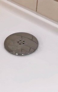 The important task of cleaning your shower waste, which you should do often to keep your shower tray clear of water and to stop the water pipe getting blocked. | Charlie DIYte