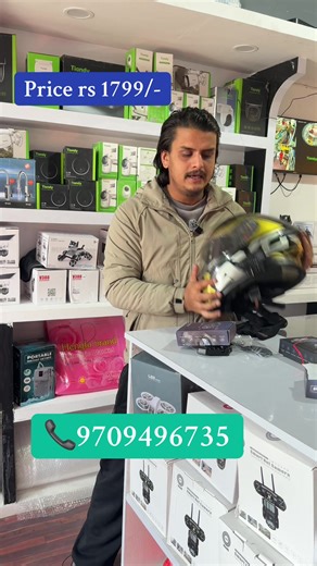 Wireless helmet Bluetooth device with dual device connectivity feature