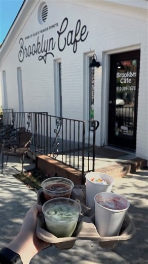 Wilmington Downtown, iNC on Instagram: "Calling all spooky coffee lovers! 👻 Brooklyn Cafe is serving up a Halloween Coffee Flight this week only — 4 hauntingly delicious drinks for just $15 ($16 non-dairy)! ☕ The Ghostbuster – Toasted marshmallow espresso topped with whipped cream & candy corn 🍵 Frankenstein’s Fury – Iced matcha with ube cold foam 🧛 Vampire Brew – Homemade cold brew with cherry cold foam & cherries 🧙 The Goblin – Midnight oil dark roast, red velvet, dark chocolate & cream Co