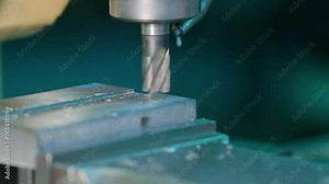 machining center high precision vertical CNC turning machine drilling on metal component in shaping forming process vertical machining centre control automation milling workpiece rotating