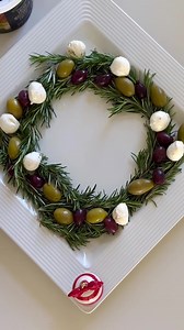 🌟✨ get ready to impress your guests this holiday season with the ultimate festive appetizer – a savory wreath of olives, cheeses, and peppers! 🧀🫒🌶️ assemble it in minutes and watch it add a burst of tasty color to your party spread. what are your favorite holiday entertaining tricks? | nora fleming